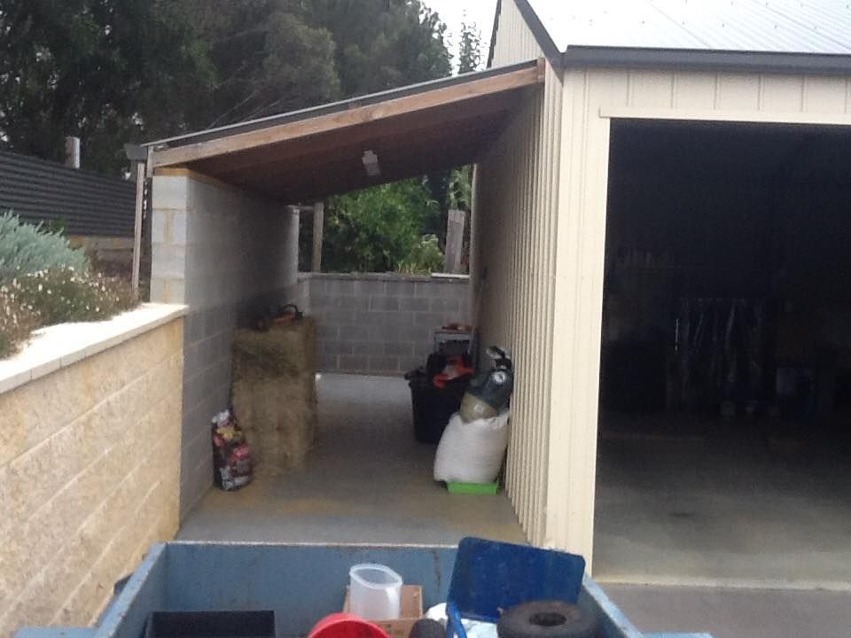 A Trailer Is Parked In Front Of A Garage – East Gippsland, VIC - East Gippsland Garage Doors & Maintenance