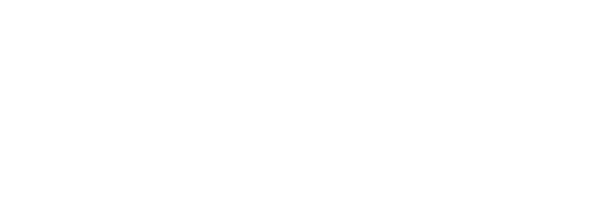 Lífleg nærmynd af bleikum dalíublómi með lagskiptum, flóknum krónublöðum sem blómstra í náttúrulegu ljósi.