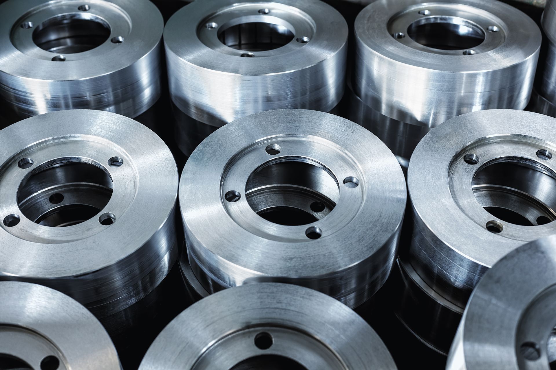 Close-up of a Stack of Machined Metal Rings — Great Western Auto Wreckers in Orange, NSW
