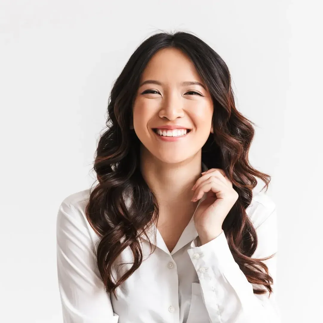 Woman with white blouse on, smiling