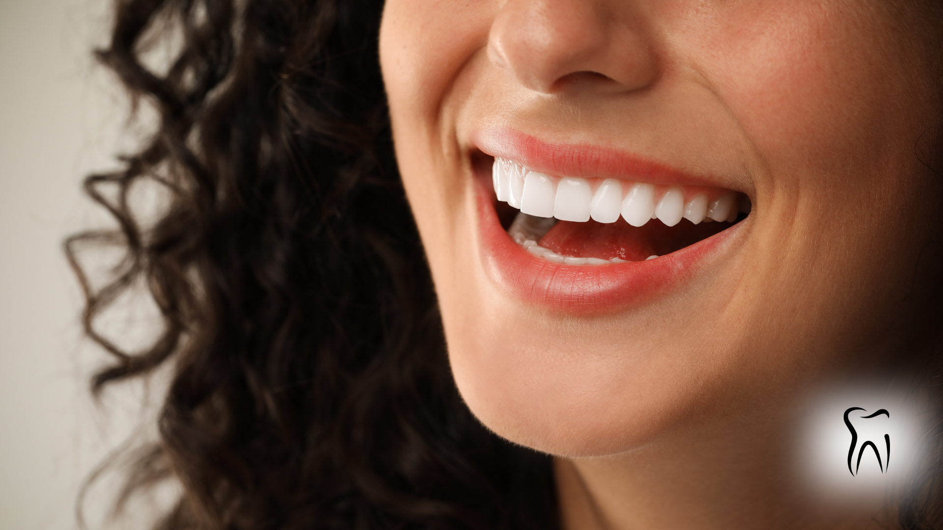 Smiling mouth with bright white teeth.