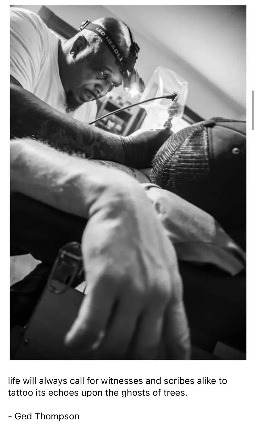 Man working, hands in focus, black and white. Quote at bottom: 