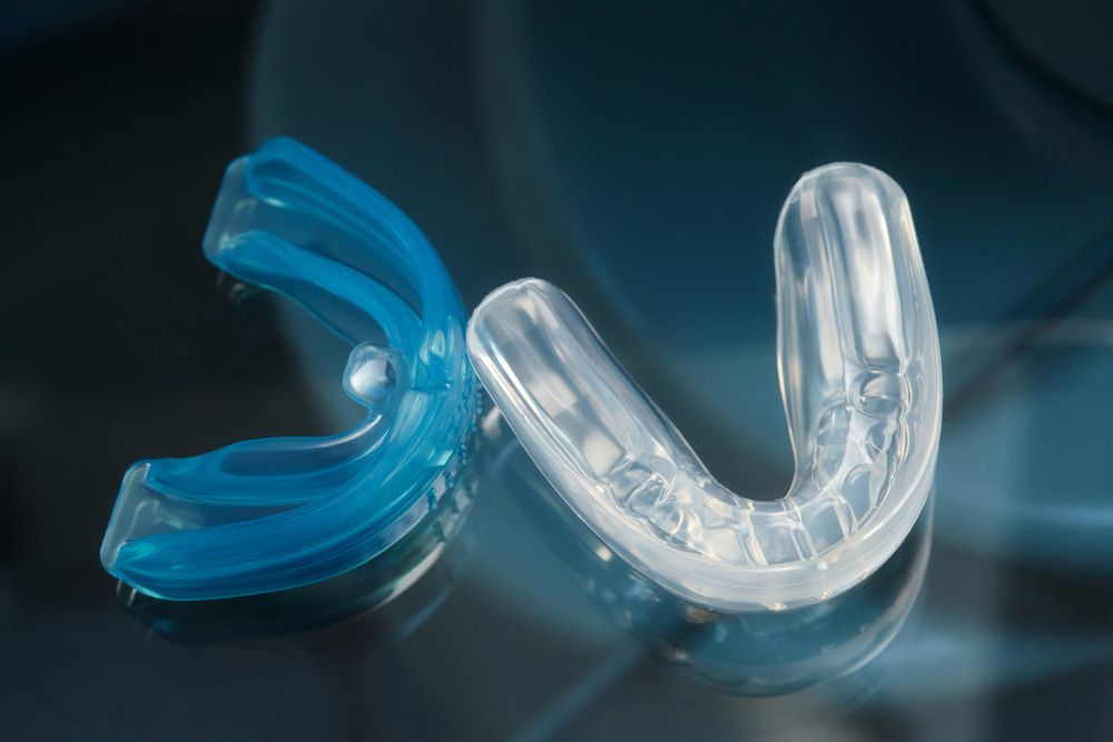 Blue and White Mouthguard — Bromley's Denture Clinic in Tweed Heads South, NSW