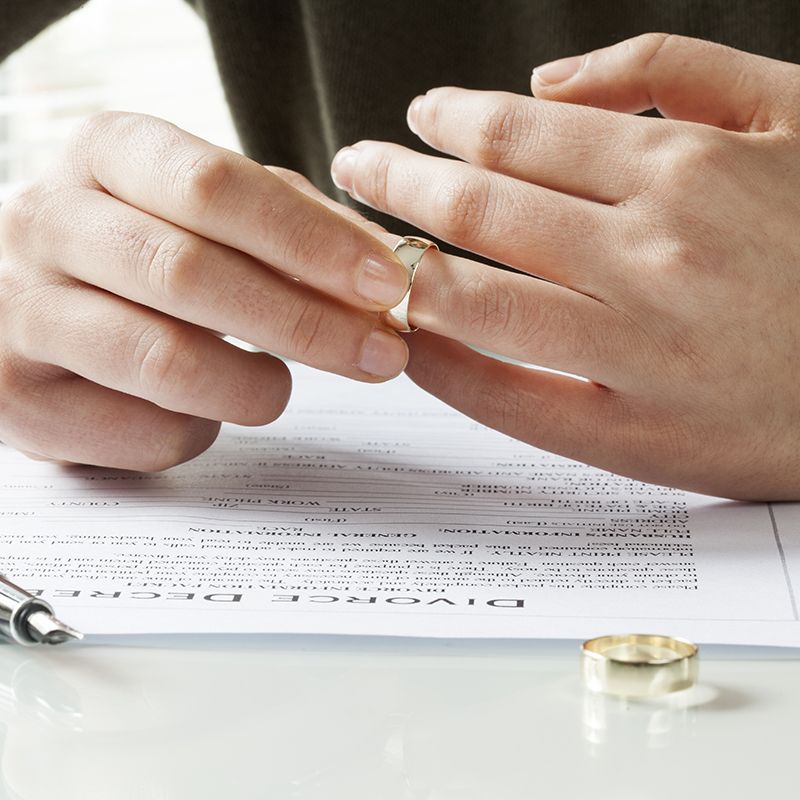 Woman Removing Her Wedding Ring