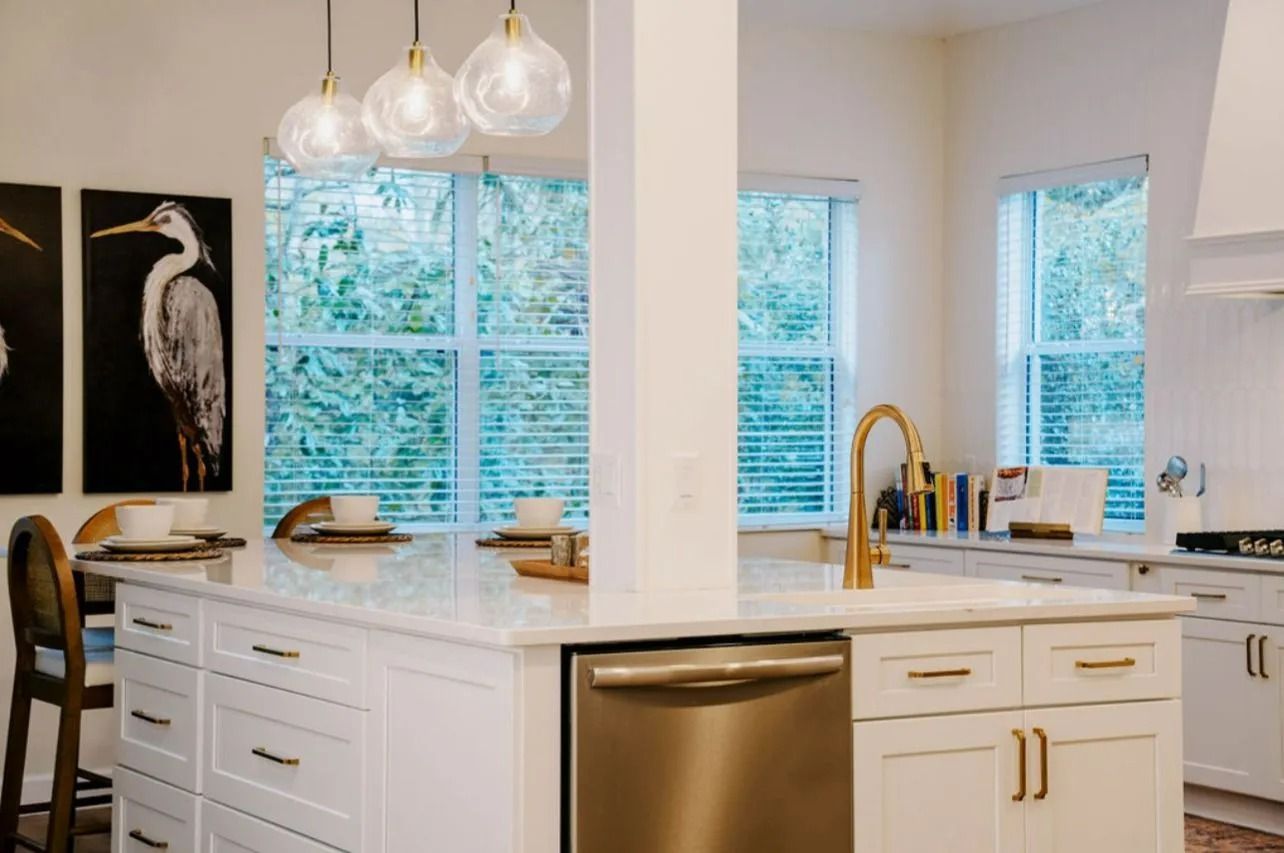 There is a large island in the middle of the kitchen.