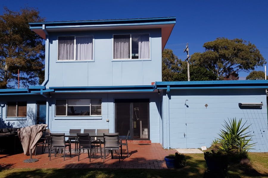 A blue house with a patio area in front of it — Axis Painting in Coffs Harbour, NSW