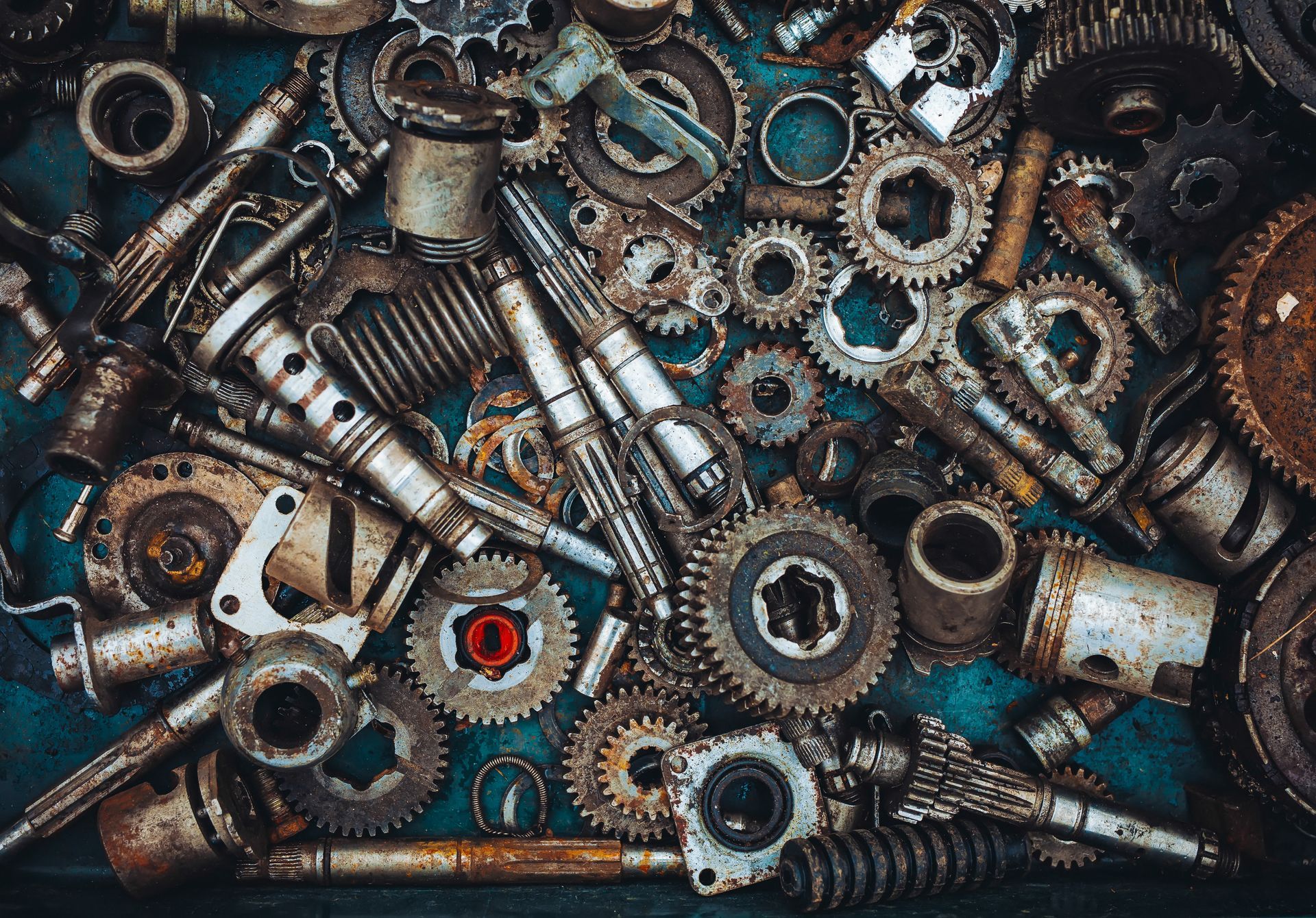 A Heap of mechanical components of car and motor parts. A Heap of mechanical components of car and motor parts.