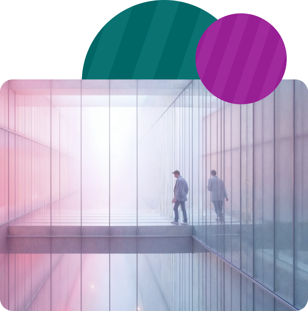 A person walks along a glass-walled corridor that reflects their silhouette, set against a hazy, pink-tinted background.