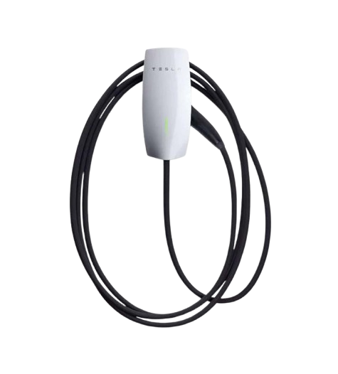 A white Tesla Wall Connector mounted on a wall with its black charging cable coiled around the unit.