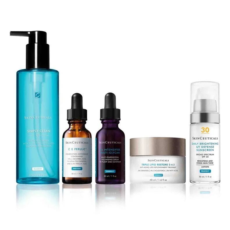 A variety of skin care products are displayed on a white surface.