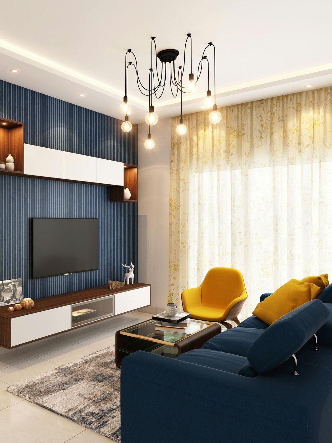 Modern living room with blue sofa, TV, and yellow armchair, featuring a unique chandelier.