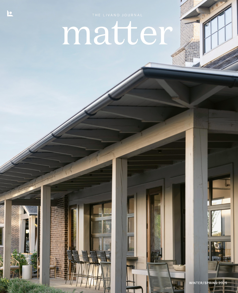 Magazine cover: porch with columns, tables, chairs, brick, modern architecture. 