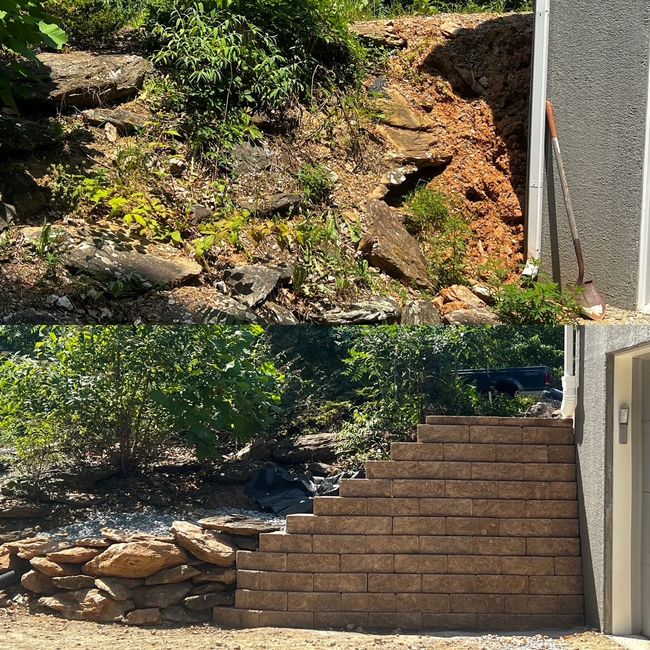 Stone steps beside a house lead up a rocky hillside with greenery and a retaining wall.