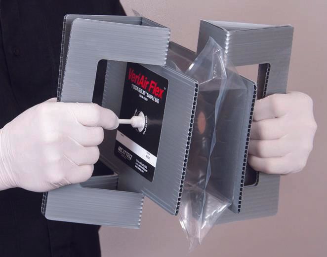 A man is taking an air sample using a Nextteq® VeriAir Flex® manual-inflating bag.
