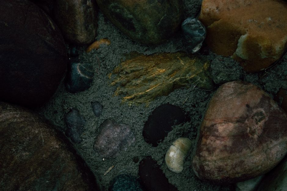 Smooth stone and fine sand texture in warm neutral tones