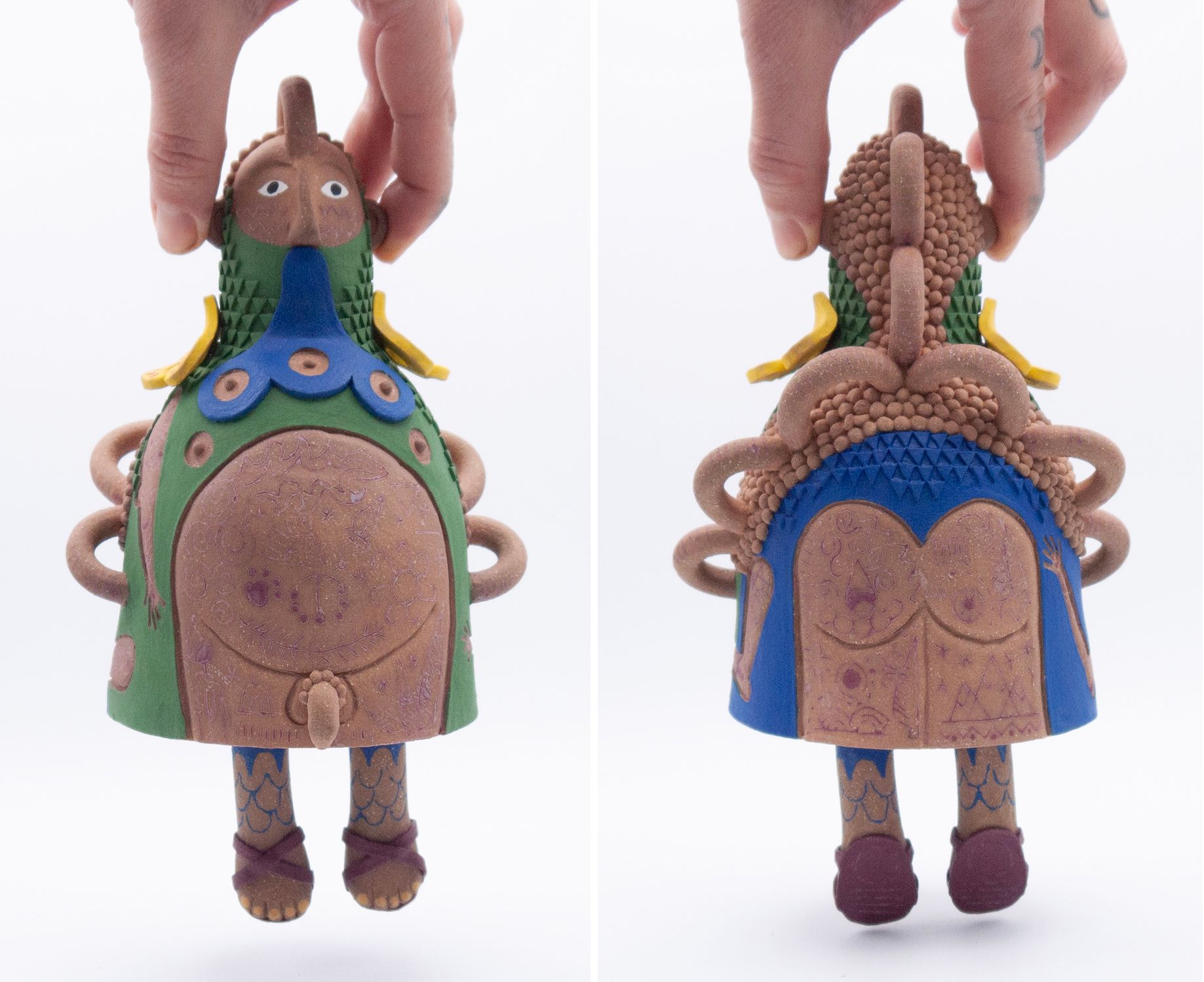 Handmade clay doll shown front and back, with blue-green outfit and braided hair, held upright by fingers