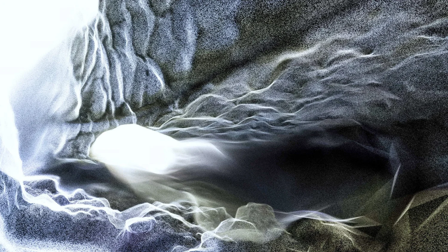 Abstract grayscale close-up of flowing fabric or smoke with a bright white center glow