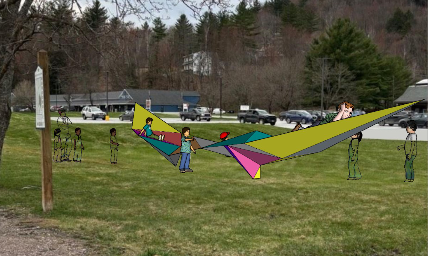 People flying colorful kites in a grassy field with trees and houses in the background
