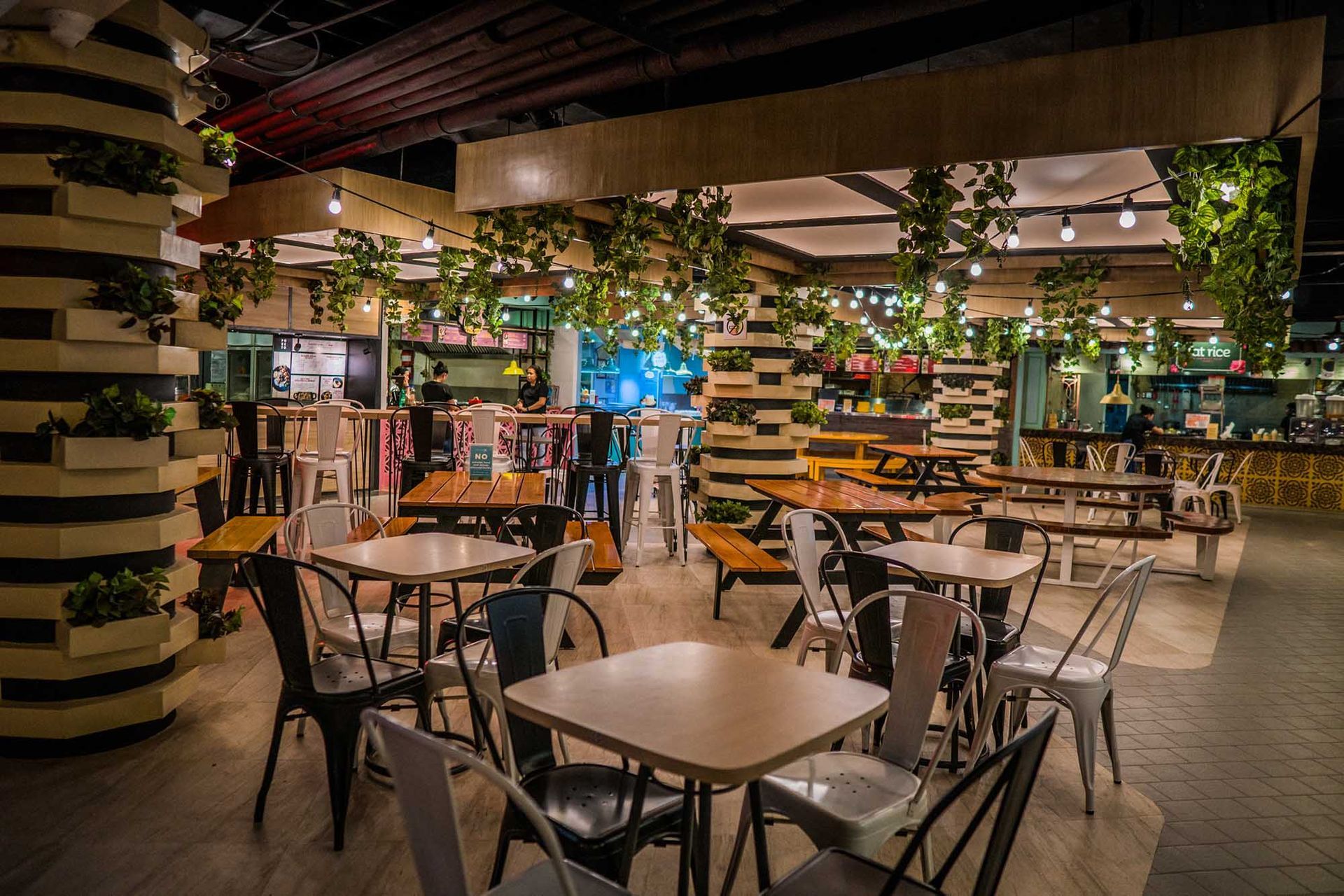 Modern food hall at Hue Hotel Boracay Station 2 with green vine decor