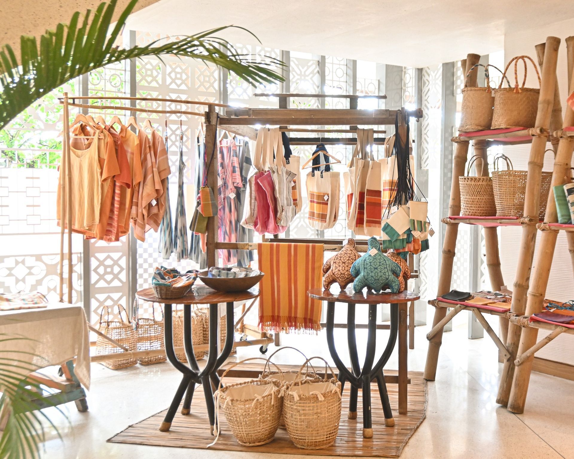 Local Souvenir shop at boracay filled with lots of clothes and baskets.