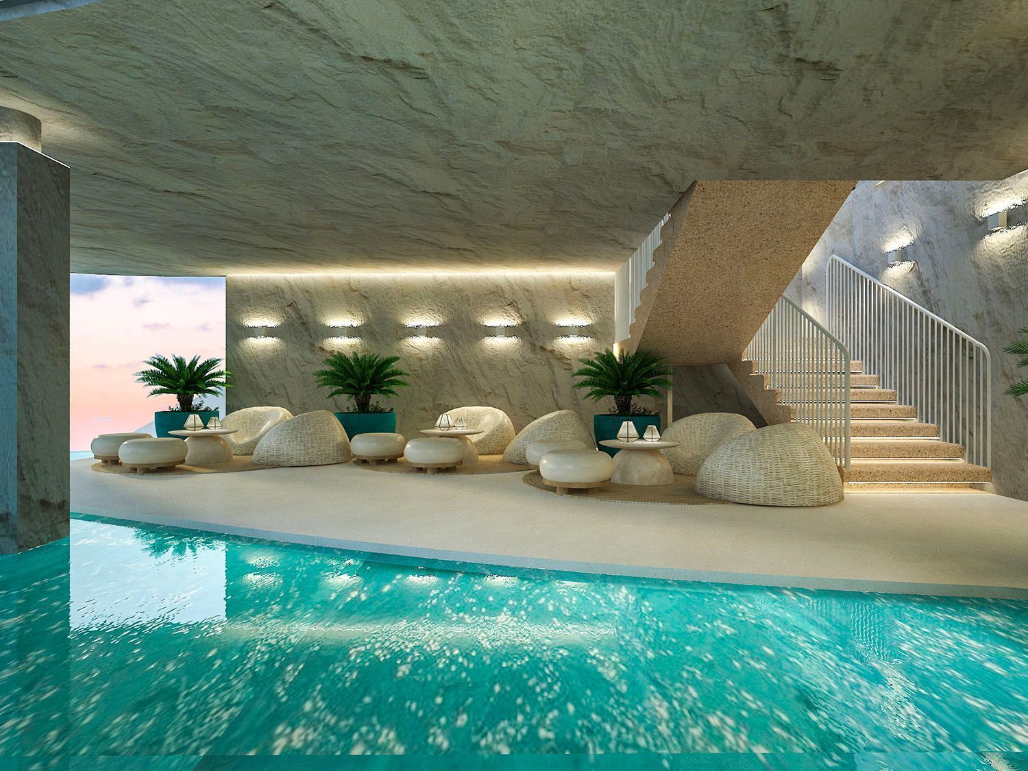 Indoor pool with turquoise water, lounge chairs, potted palms, and stairs under a concrete ceiling.