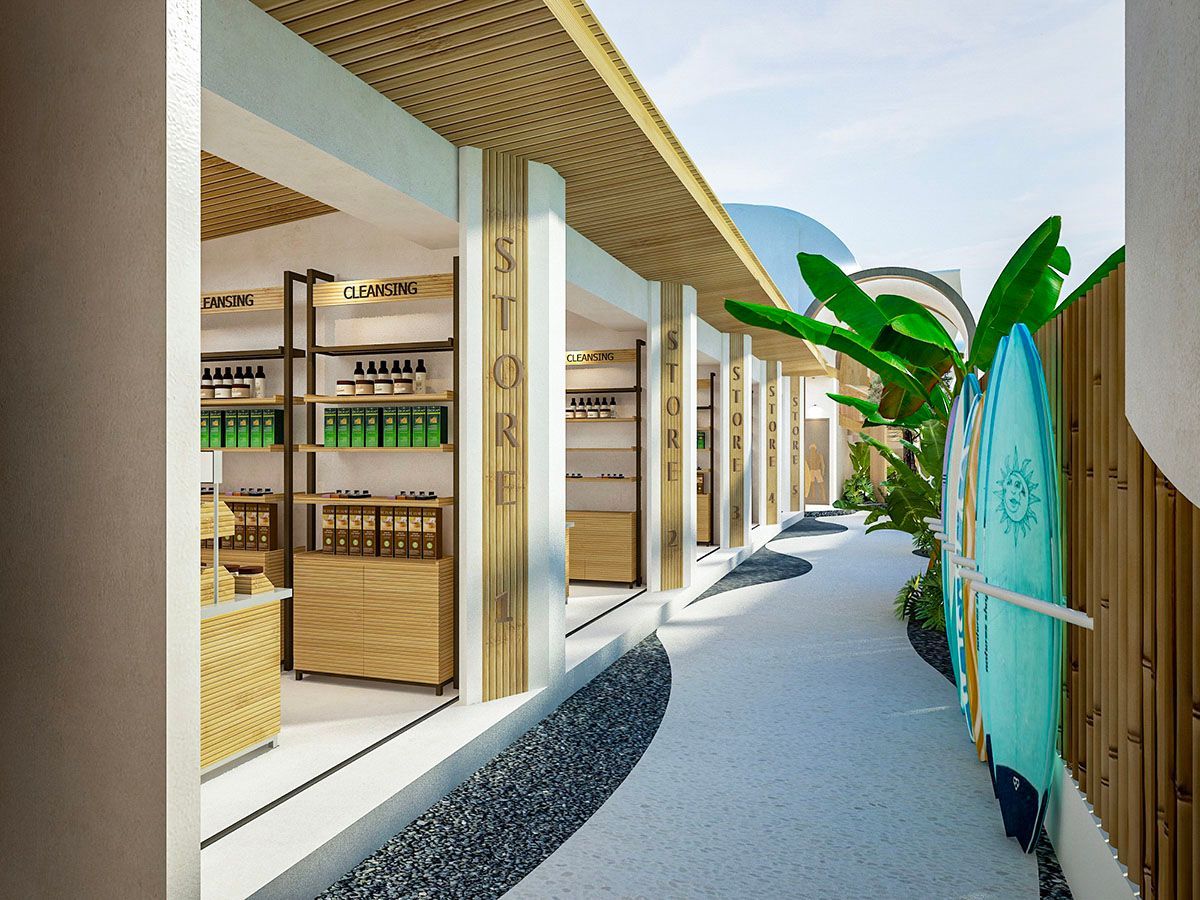 Tropical open-air retail shops with cleansing products and surfboards at Hu