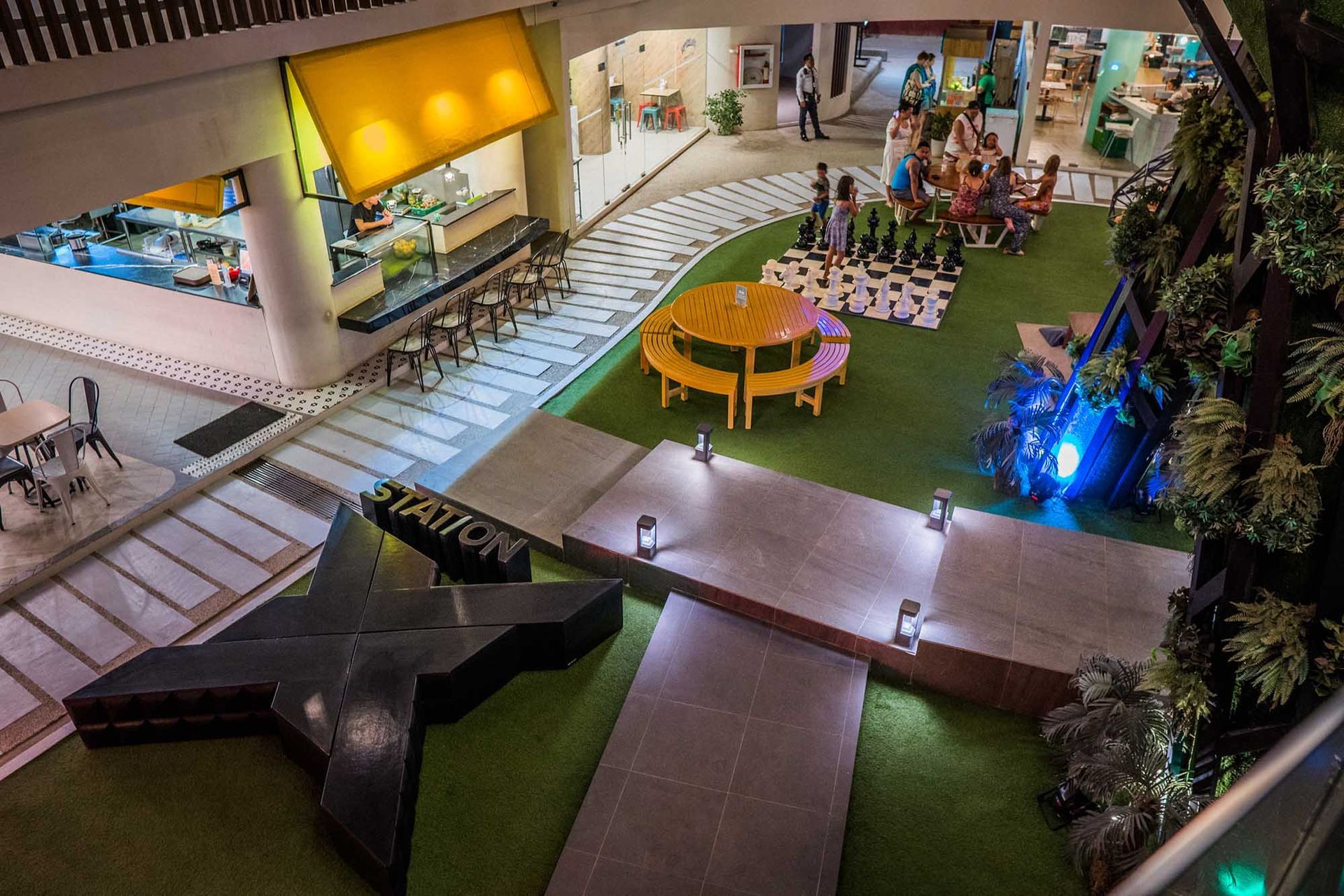 Hue Hotel Boracay Station X common area with giant chess and food hall
