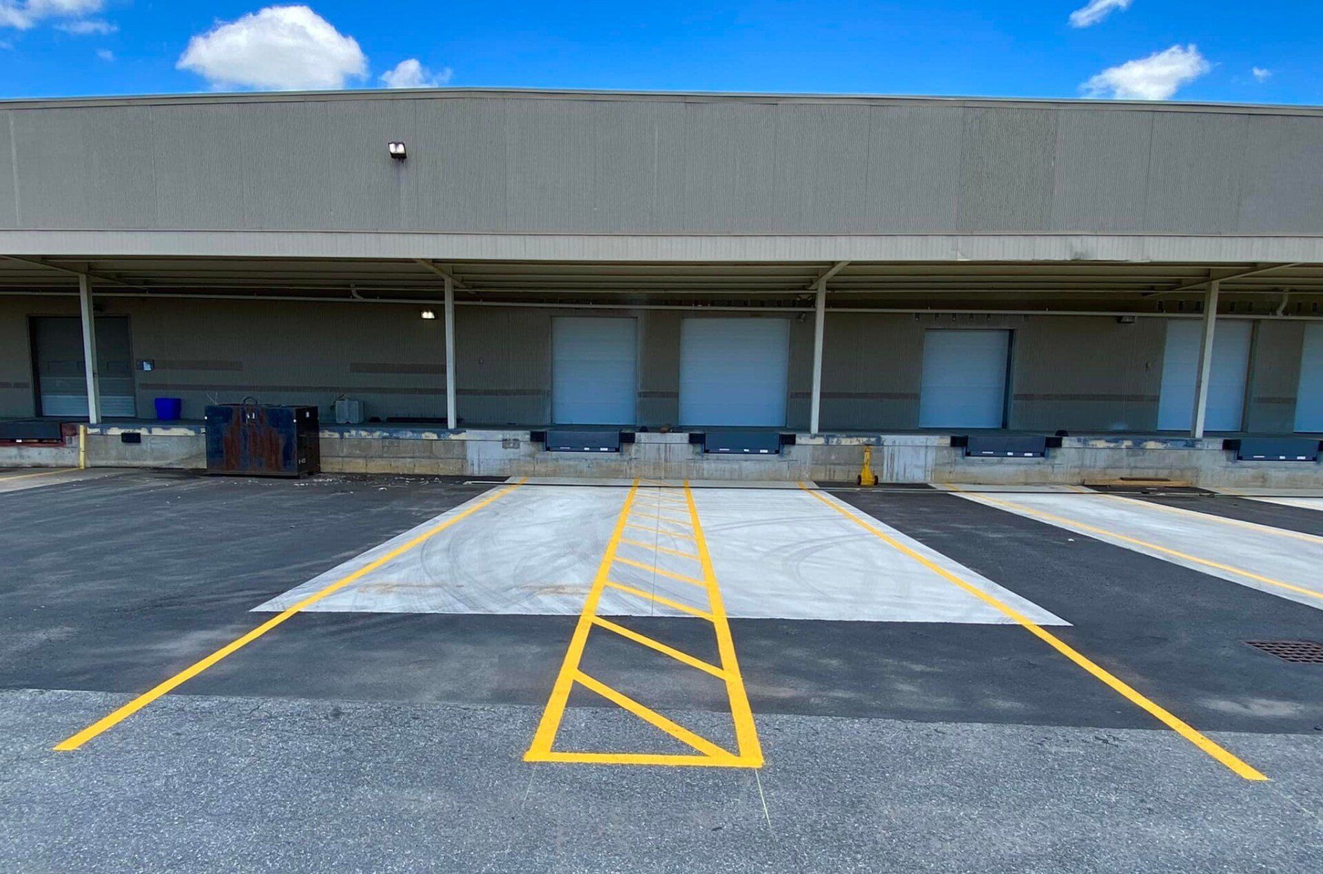 line striping, pavement markings, ada parking lot markings, west & central ma, ginger cat sealcoating