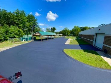 sealcoating, line striping, crack sealing, paving repair, west & central ma, ginger cat sealcoating