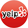 A yelp logo in a red circle on a white background.