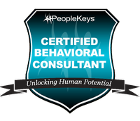 PeopleKeys Certified Behavioral Consultant badge with teal shield and “Unlocking Human Potential” ribbon