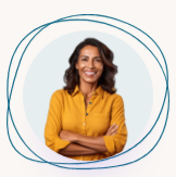 Smiling person in a mustard yellow shirt with arms crossed, centered inside a blue circular outline