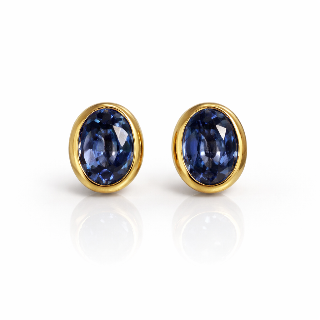 Oorsteker blauwe steen tanzaniet paarse steen 14k goud Juwelier Schouten Middenwaard