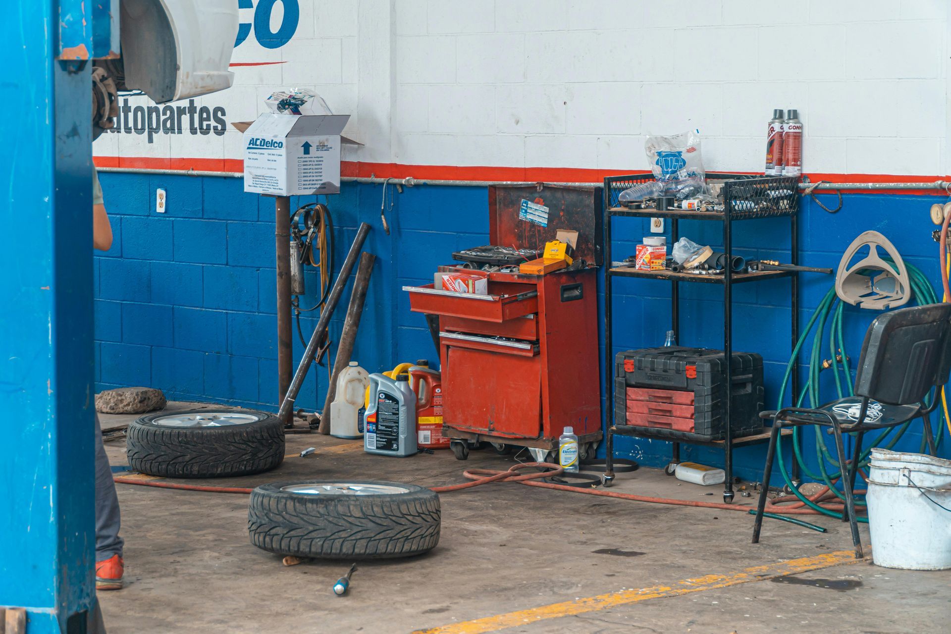 Auto Repair Bay With Tires And Equipment | Dial A Tire Automotive Service Center