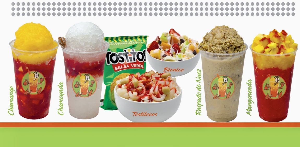 Colorful Mexican treats including drinks, chips and fruit salads.
