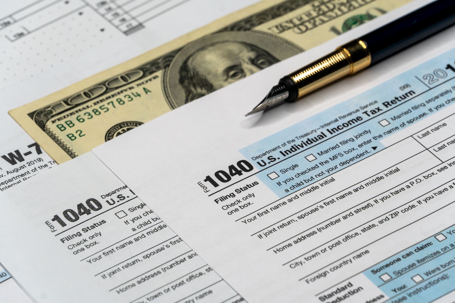 Detail closeup of current tax forms for IRS filing.