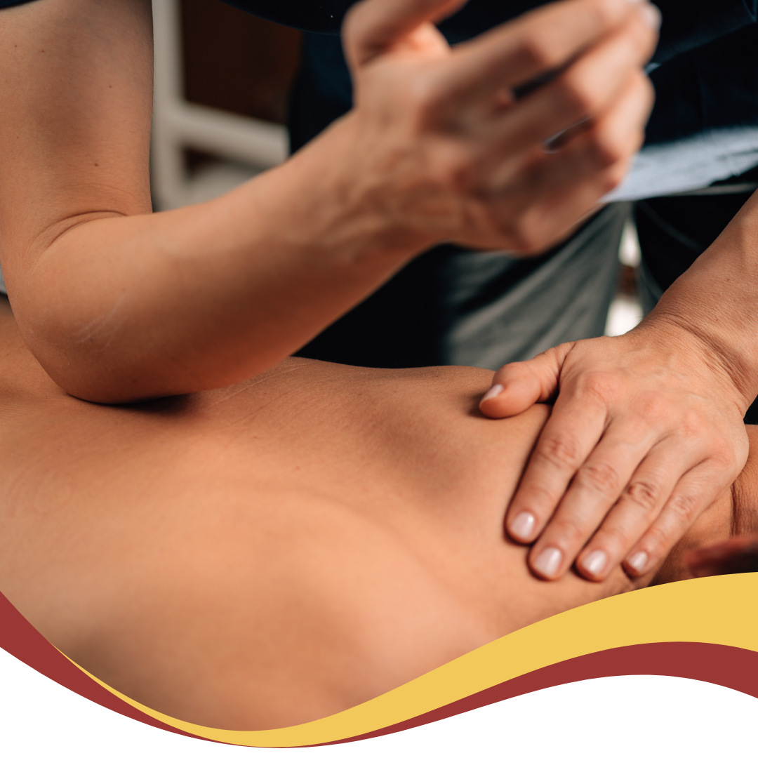 A man is giving a woman a massage on her back
