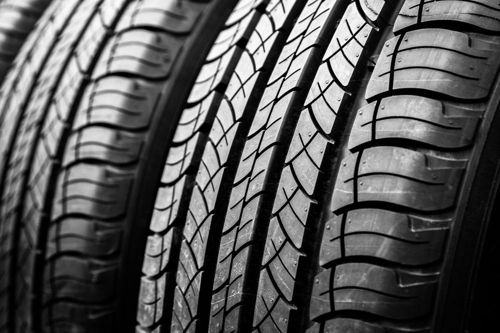 Black and White Close-up of a Stack of Car Tires — Ben's Tyres in Geurie, NSW