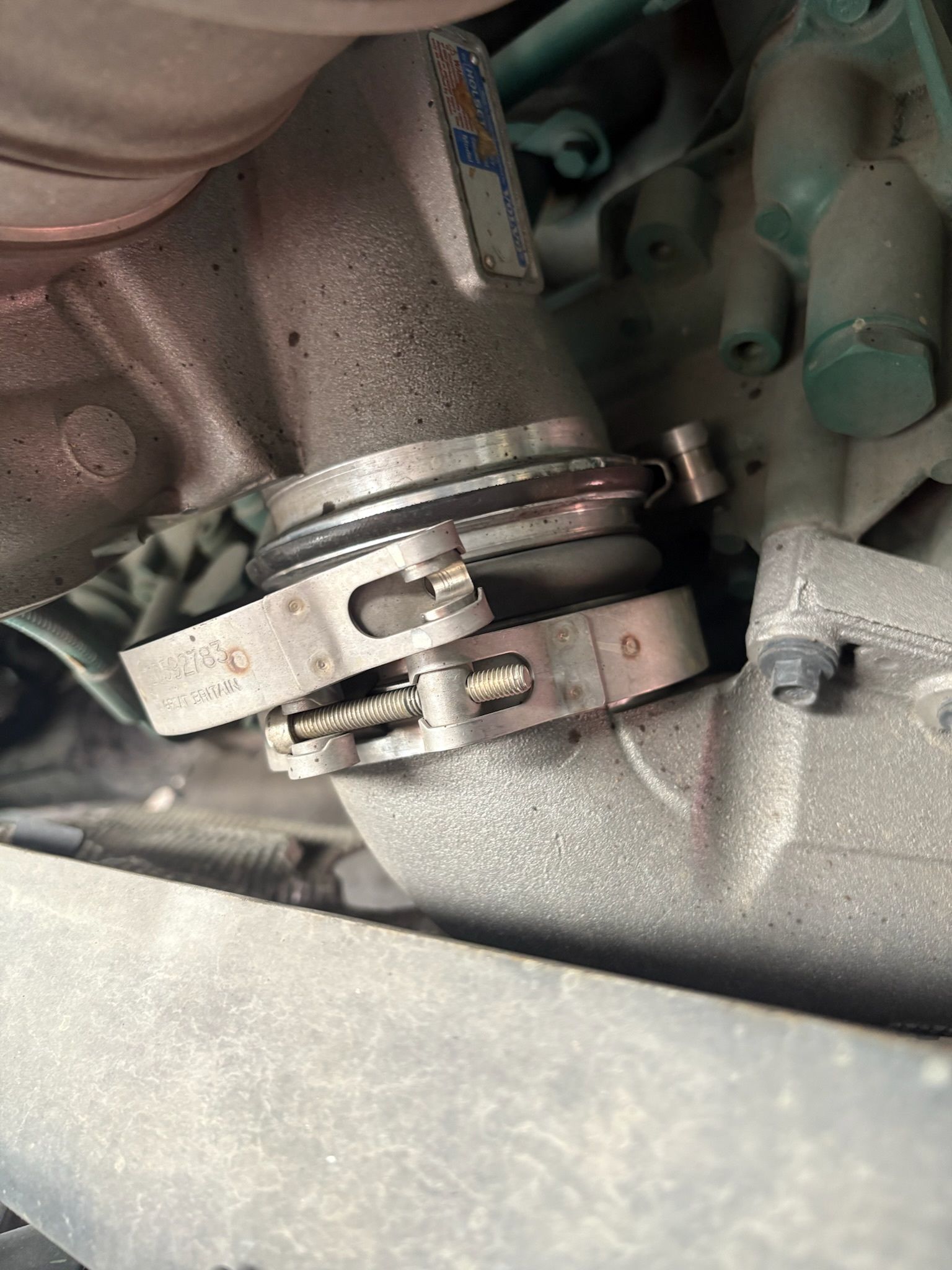 Metal Pipe Connection With Clamp Fasteners on a Vehicle Engine — Prime Mobile Mechanics in Varsity Lakes, QLD