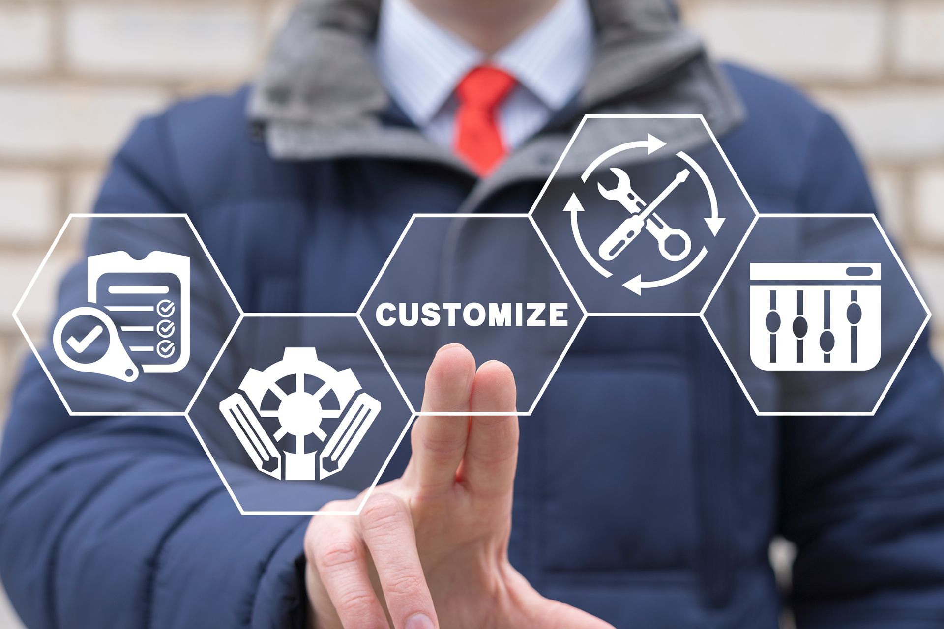 A man is pressing a button on a screen that says customize