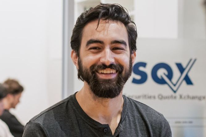 A smiling SQX team member.