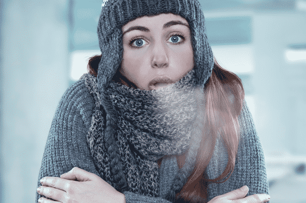 Woman bundled in winter clothing Woman bundled in winter clothing