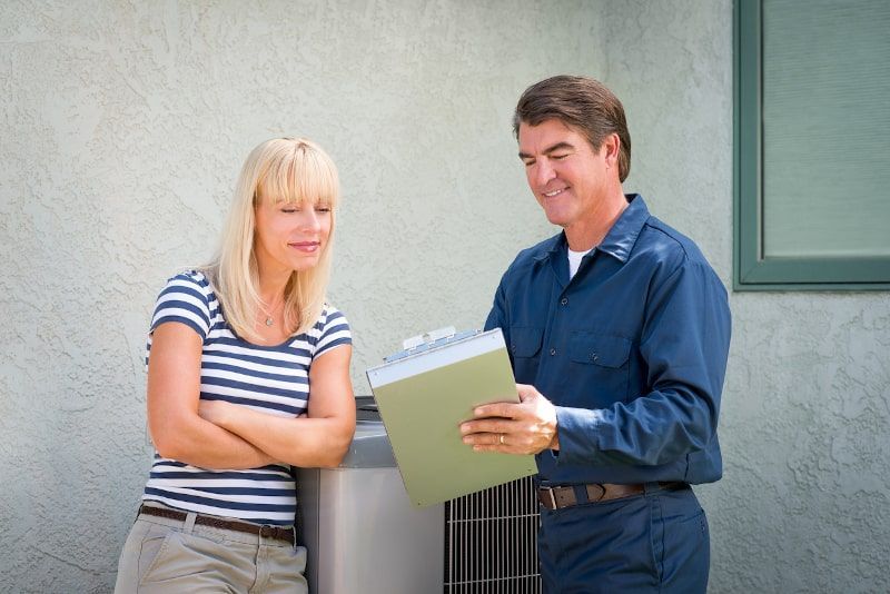 Technician explaining to a customer