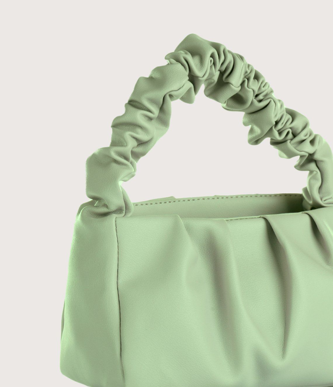 Light green, ruched handbag with gathered handle.