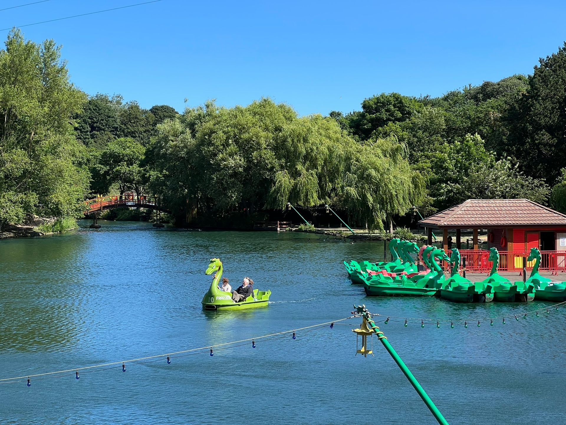 Dragon-themed boats on the lake at Peasholm Park in Scarborough.