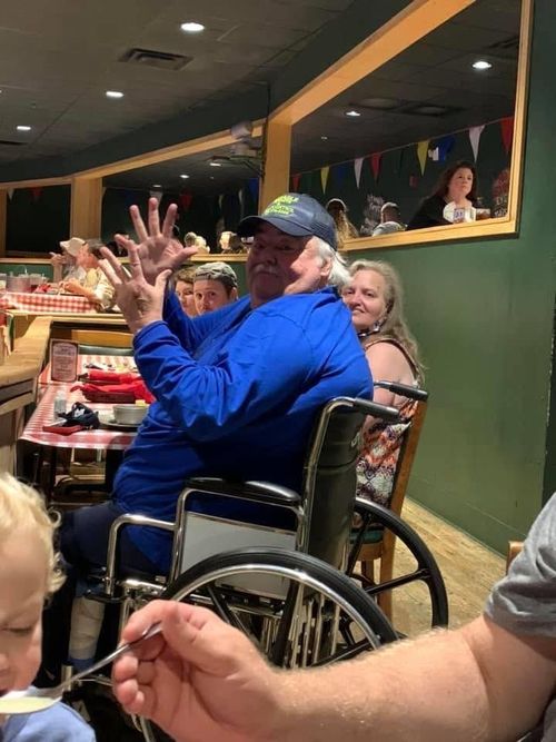 Founder Kenneth Walters sharing a laugh with family at a restaurant