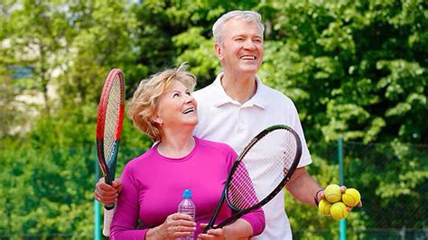 seniors playing tennis