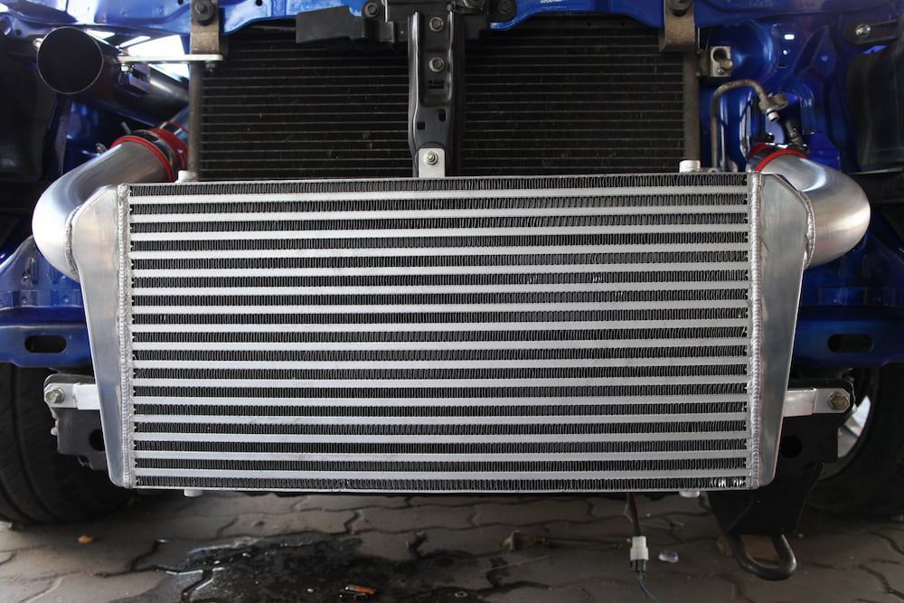 A Blue Car with An Intercooler on The Front of It — Steve Purse Automotive In Tomerong, NSW