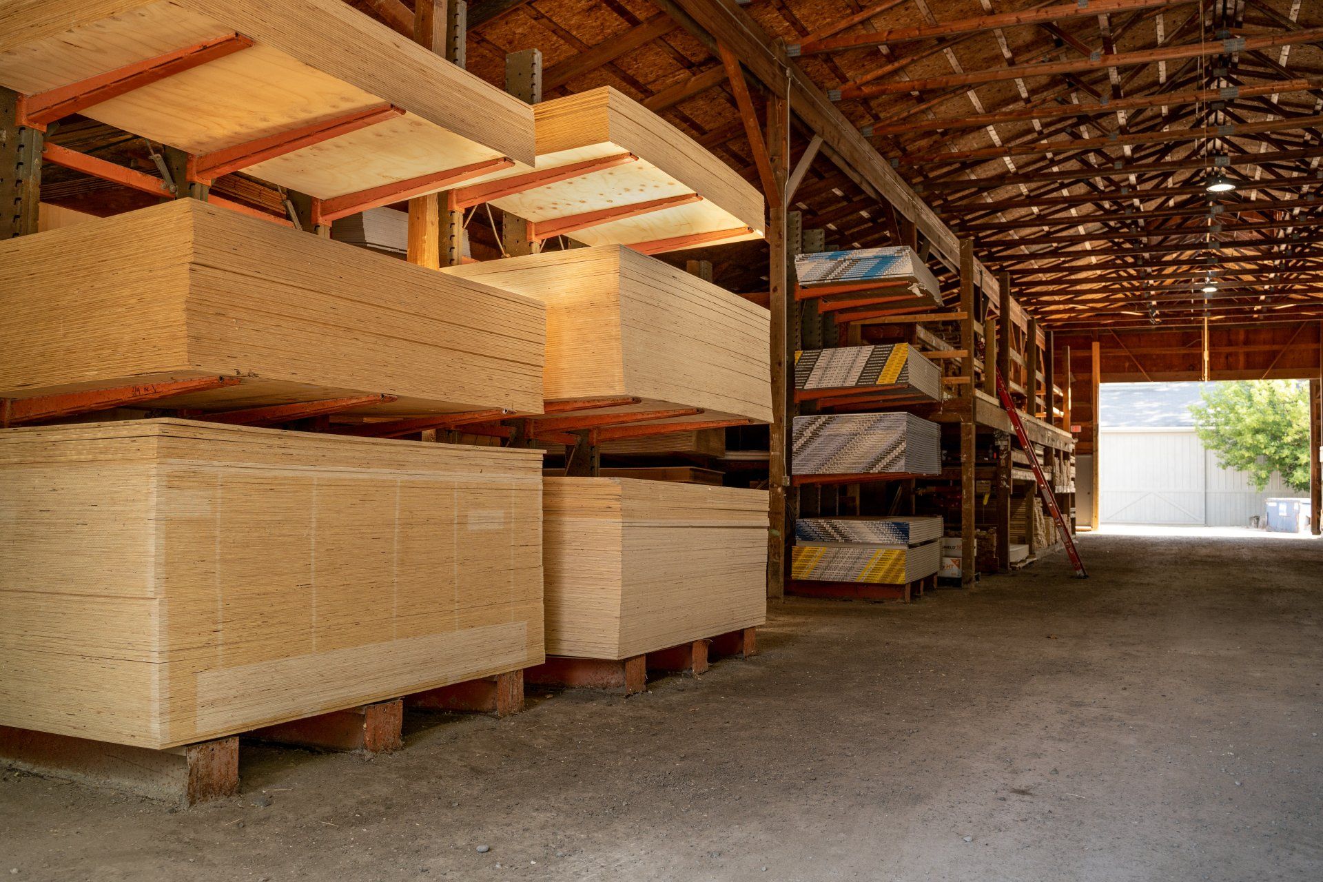A large warehouse filled with lots of wooden boxes.