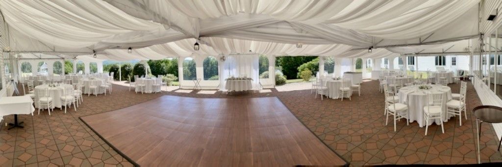 There is a dance floor in the middle of the room.